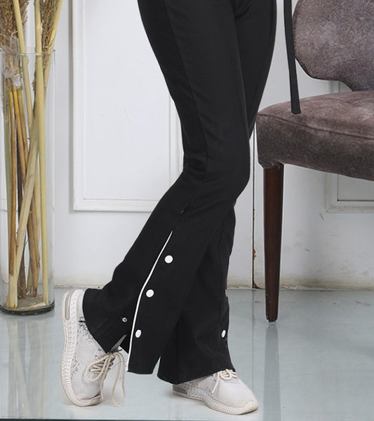 بنطلون ليجن خروج شارلستون مع أزرار جانبية بارزة من اورا