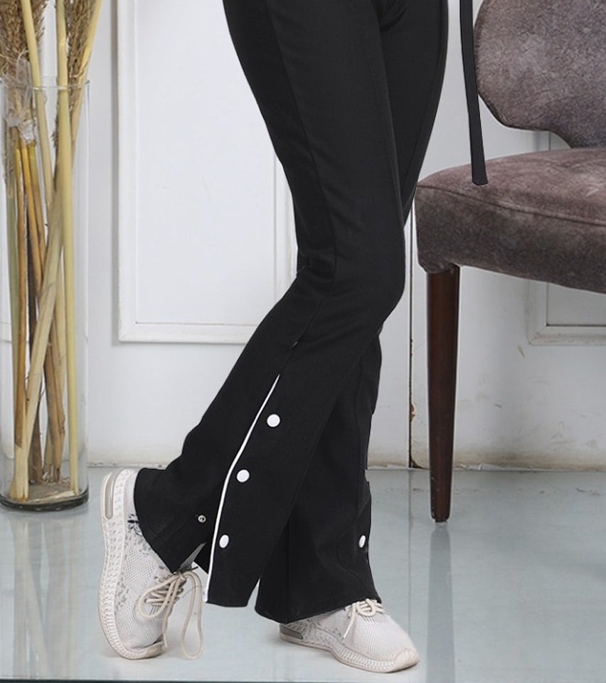 بنطلون ليجن خروج شارلستون مع أزرار جانبية بارزة من اورا